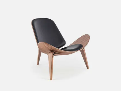 Poltrona Design in legno con seduta in pelle di Sigerico
